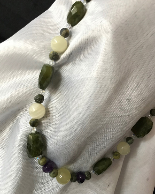Olive Green Dioptase with Amethyst. -1